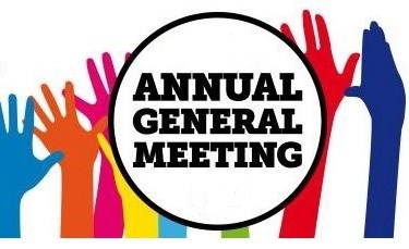 Many hand with sign saying Annual General Meeting